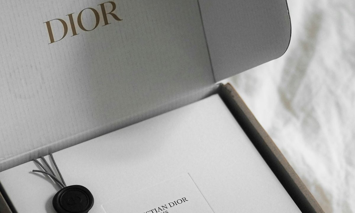 Dior gift box with wax seal and ribbon