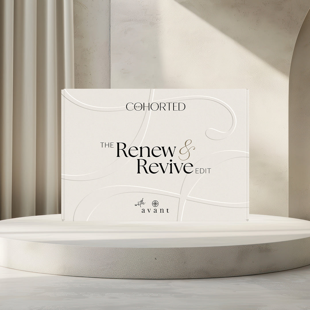 Product packaging with 'Cohorted' branding on a neutral background. Skincare product set with 'Avant' and 'Cohorted' branding on a neutral background. Avant Skincare, Cohorted, beauty box, UK, gift, for her, Renew and Revive, luxury skincare. 