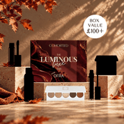 Cohorted Beauty luminous luxe subscription gift box featuring Ofra skincare and beauty products in elegant packaging.